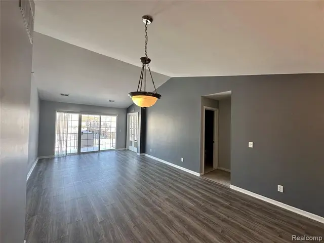 Bright great room with cathedral ceiling